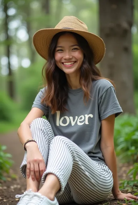 Female Subject - The image shows a young woman.Straw Hat - The woman is wearing a straw hat.T-shirt - The woman is wearing a gray T-shirt with "LOVER" written on it.Striped Pants - The woman is wearing white and gray striped pants.Sneakers - The woman is w...