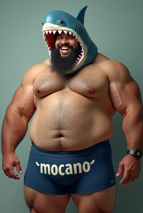 Strong, hairy, bearded mixed race man, smiling, with a shark head costume on his head, with navy blue underwear with “MOCANO” written in large capital letters on the elastic of the underwear, with a curious man watching.