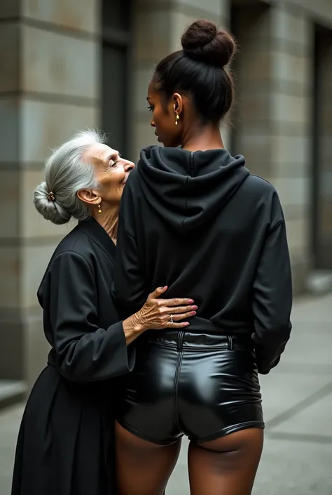 black woman hair in a bun black hoodie black leather short shorts a old grandma in a dress on her knees kissing her ass behind her squeezing her butt
