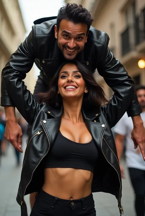 Smiling Nora fatehi in black leather jacket lifting and picking up a chubby man on her head , full view