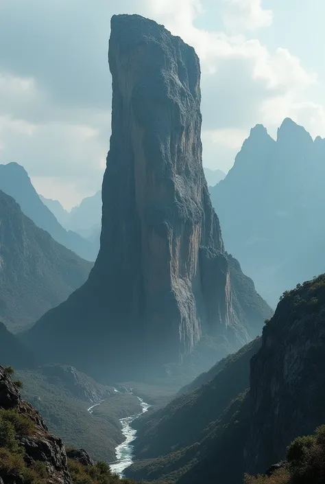 giant rock at the end of the world, looking like a giant finger on the mountain