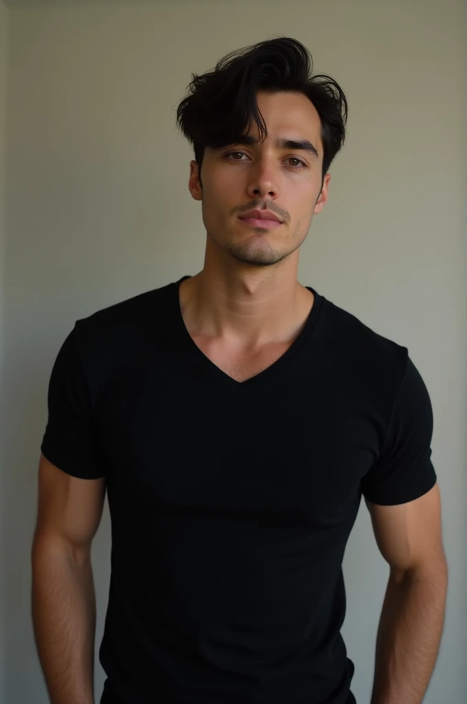 Handsome guy with dark hair and a black t-shirt 