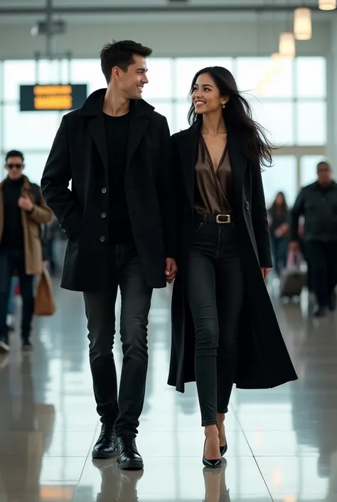 Asian couple. Beautiful and handsome, man with neat black hair, wearing a black parka jacket, black jeans, high boots. Woman with long black hair. Wearing a luxurious long blouse, long black jeans, wearing heels, both smiling. Walking in airport