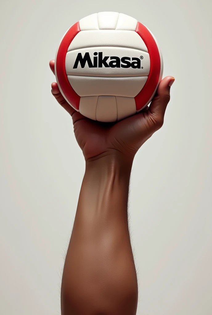 A fist lifting a Mikassa volleyball


