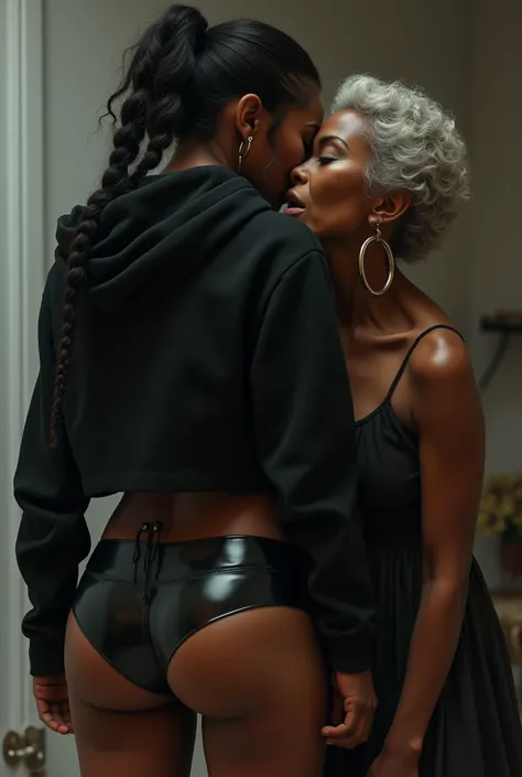 black woman hair in pigtails black hoodie shiny black leather short shorts pockets in shock as a old grandma in a dress on her knees kissing her ass behind her hand is in her ass holding her ass backside view french kissing love making