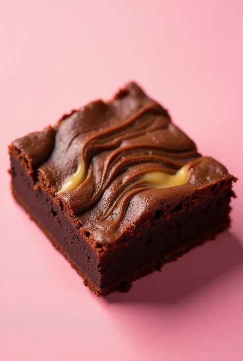 An image to promote a brownie with a dulce de leche flavor that makes you want to eat it in the dough Image to put on a package with a pink background 
