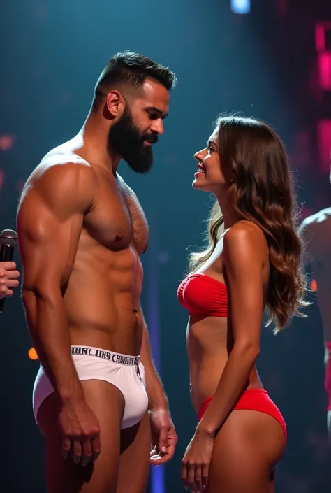 Strong muscular bearded hairy young Puerto Rican man in white underwear, standing, next to a beautiful woman in red panties topless, going topless, without bra, OUTSIDE BREASTS, facing the audience, on a stage of a television program presented by a famous ...