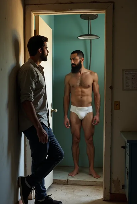 Shirt reporter, pants and sneakers leaning against the door outside an old house watching a strong, bearded Iranian man taking a shower in white underwear inside the house.