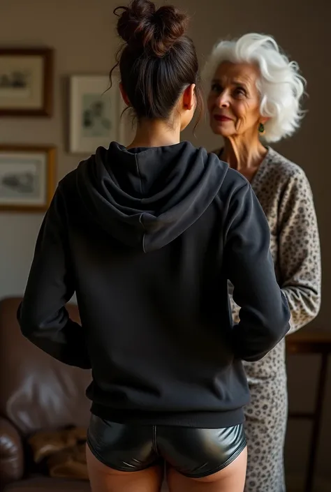 black woman hair in a bun black hoodie black leather short shorts being fucked in the ass by a old grandma in a dress