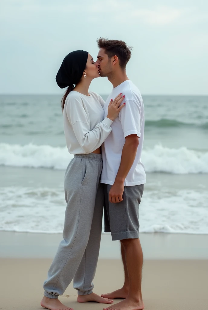 with black headscarf, white long sleeve t shirt, barefoot, grey sweatpants, skinny woman kissing her boyfriend on the beach. 