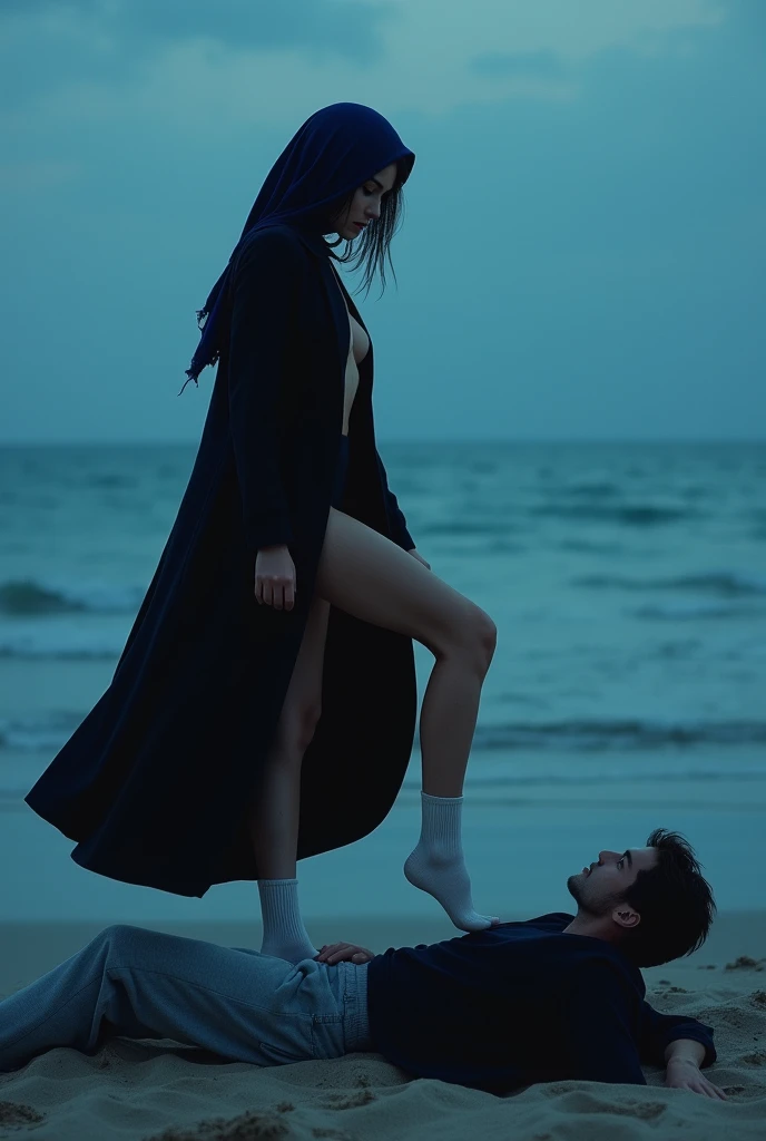 Navy blue headscarf on the beach, Black long coat, white socks, Sexy skinny woman. Man lying in front of woman. Woman puts her foot on the front of man&#39;s sweatpants. 