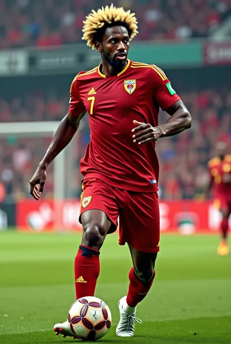 Black man with blond afro hair and thin beard wearing a red team shirt playing soccer 