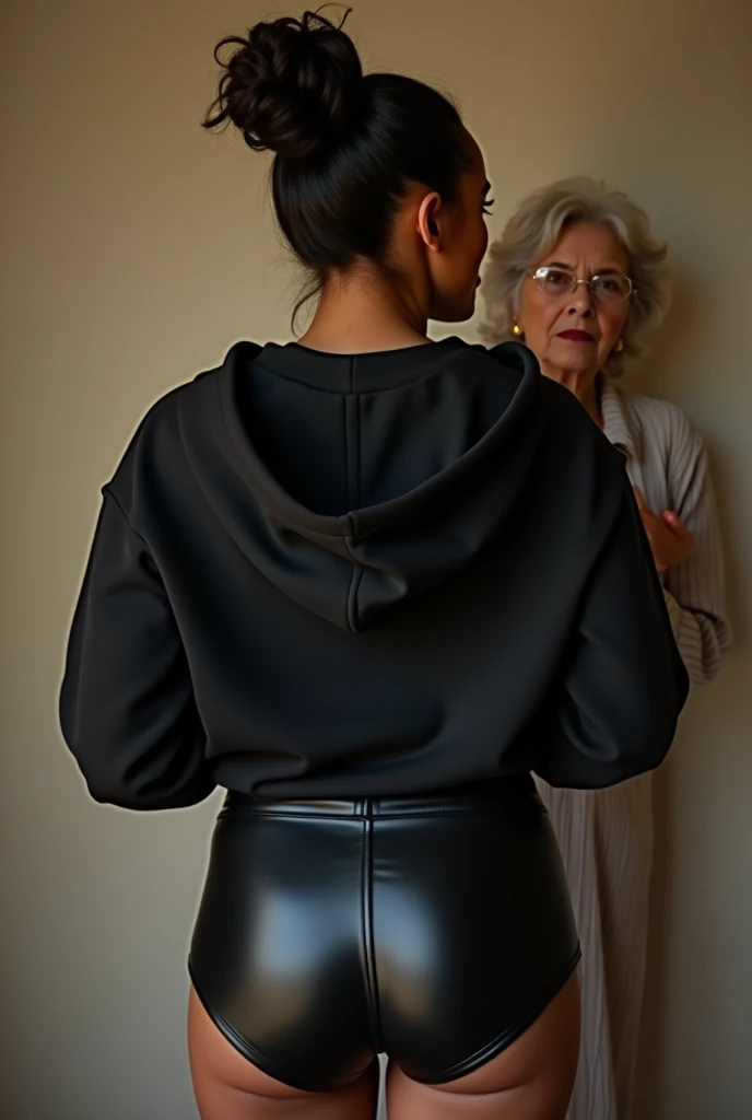 black woman hair in a bun black hoodie black leather short shorts being fucked in the ass by a old grandma in a dress
