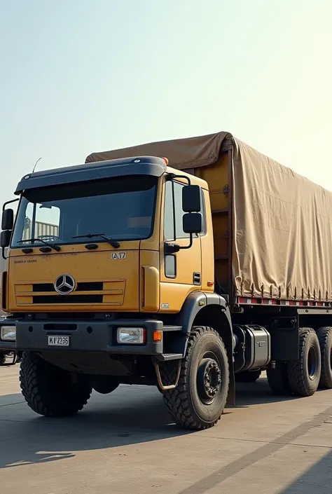 Large truck with tarp on the back to protect the load it carries