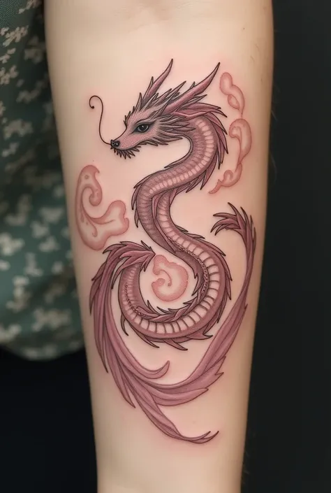 A delicate feminine dragon tattoo on the arm 