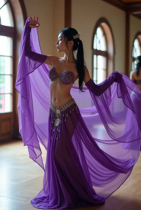 Young fair-skinned Japanese woman belly dancing in a dance studio。She&#39;s wearing a purple veil and a very sexy outfit.。