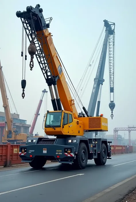 SANY brand crane, road, carrying out an operation within an industry with the name “G-MAQ” written on the lance 