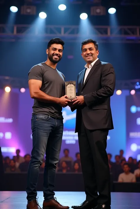 "Create an ultra-realistic, highly detailed image of a young South Asian man with a muscular build, standing on a stage and receiving an award from a chief guest. The man is wearing a fitted dark grey T-shirt and jeans, and both he and the chief guest are ...