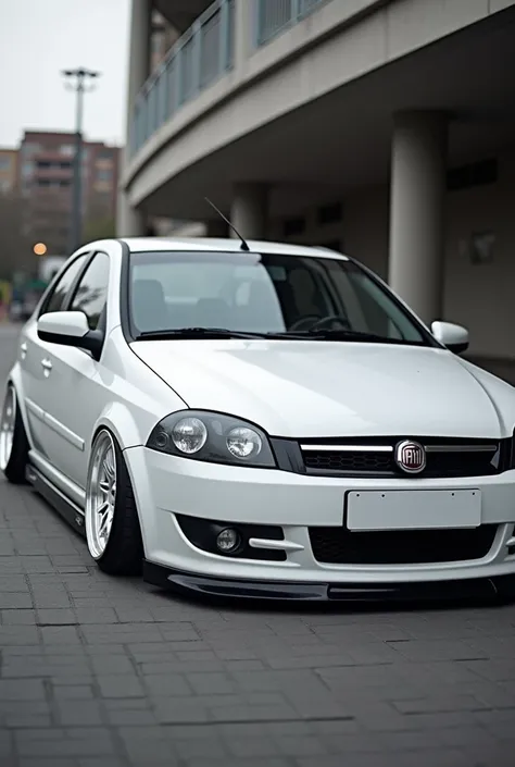 I want a white Fiat Siena 2007 lowered with 15 sporty wheels