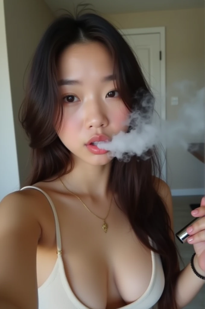 Japanese teen with big breasts gets fucked, holds an e-cigarette in her mouth and blows out smoke, takes a selfie