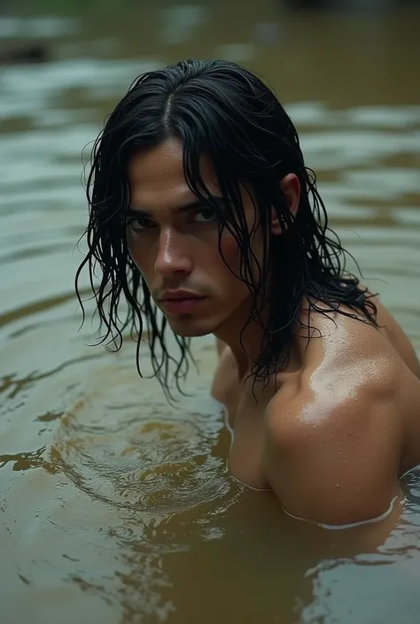 man, long hair, muddy water around, emerges from the water, side view , look at the camera , wet 