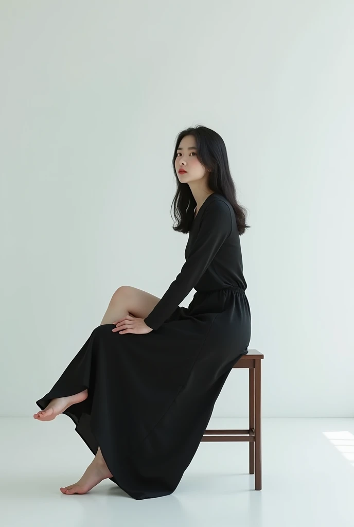 a pretty young adult korean woman, straight black hair, sitting on a chair in an empty room, legs crossed, she is wearing a black dress, white background, 4K HDR