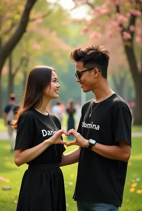 Create 20 years old girl and boy sitting in beautiful Park ground with stylish pose And Making heart with your hands, eyes to eyes contact. girl and Boy wearing black shirt, with name "Danish or girl name momina" write on shirt with white shoes. he is Look...