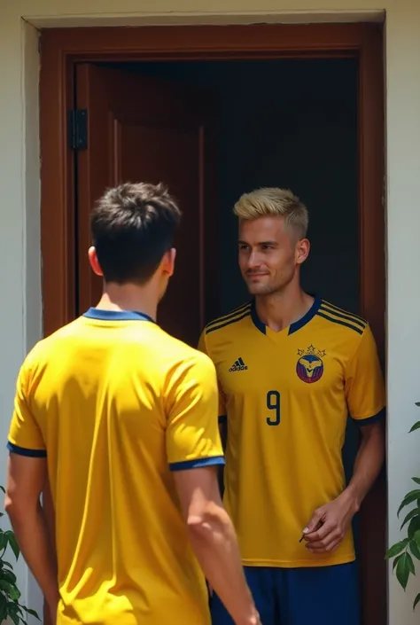 A man with short dark hair, with the yellow shirt of the Colombian national team, backwards, with his face looking at the brown door of a closed house. At the door of the house there will be a soccer player with the yellow shirt of the Colombian soccer tea...