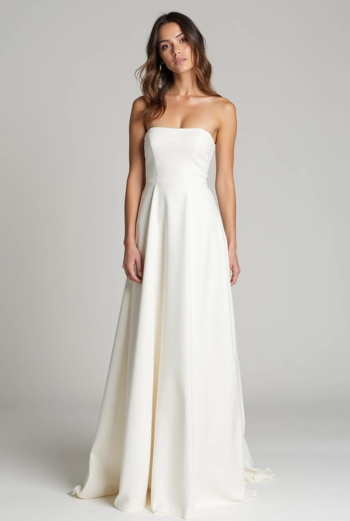 Simple white strapless straight dress with long skirt to be worn at the Grammy awards.