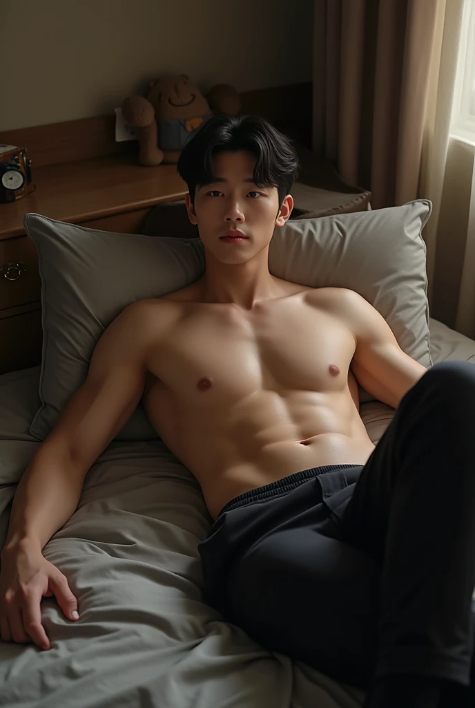 lee do hyun is lying on the bed when wearing black socks and his sexy 6 packs revealed when taking off his shirt ( he is wearing pants as he just got back from work)