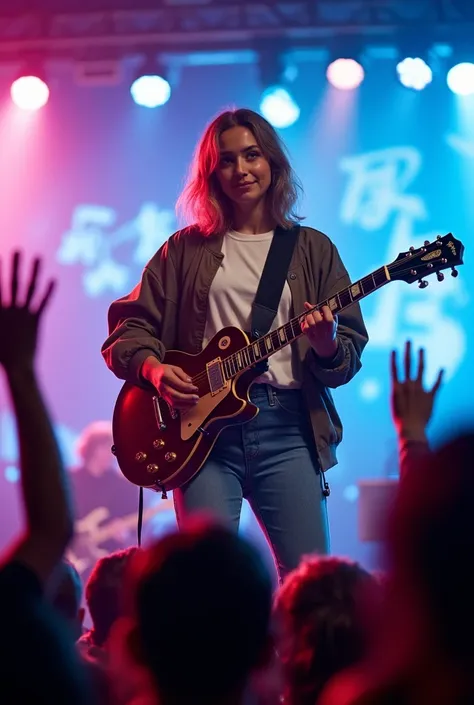 A photo of a 20-year-old beautiful woman performing on stage, playing the guitar with passion. She is wearing an oversized t-shirt, a bomber jacket, and jeans. Her outfit is stylish and modern. The background is a concert venue with a large LCD screen refl...