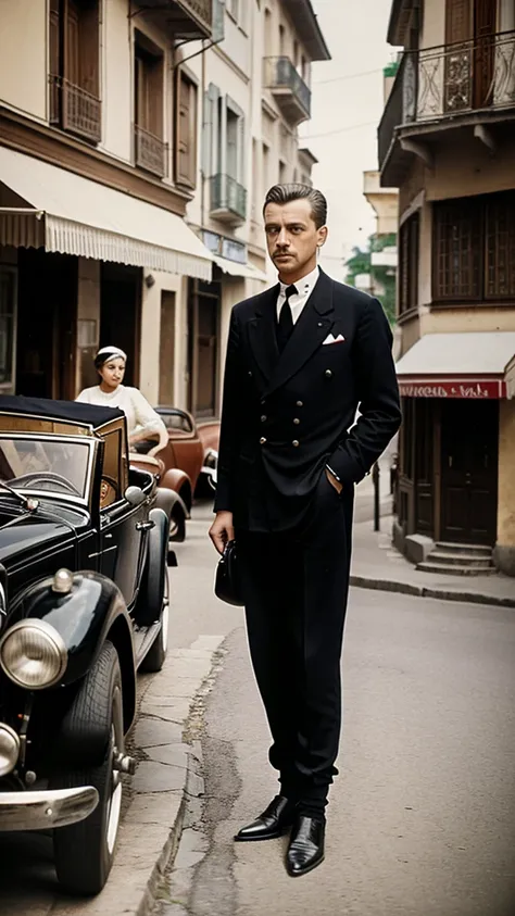 A quiet street with Gavrilo Princip standing near a café, spotting Franz Ferdinand’s car. The car has stalled, and Princip seizes the moment. He is in the foreground, pulling out a small handgun, while the car is in the background with the Archduke and his...