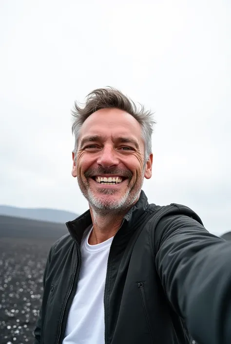 Adult man on volcanic sand smiling for a selfie white background 