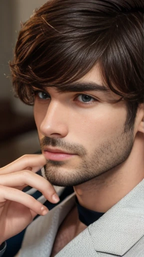 A man Aryehteriane medium hair focus on the face.