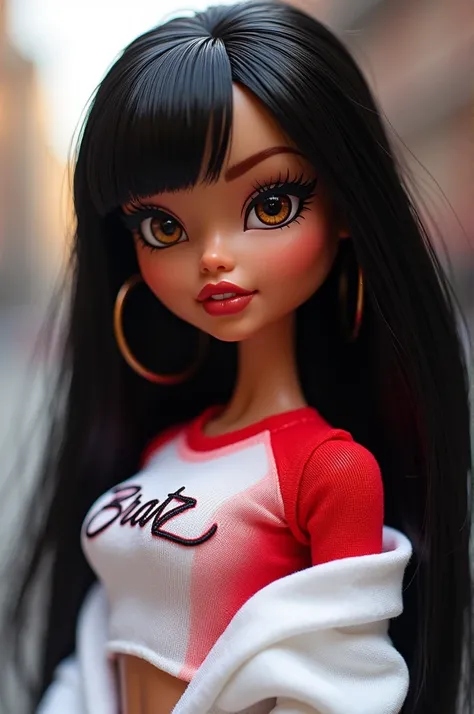 A bratz doll with long, straight black hair and light skin and brown eyes  , She is wearing a red and white shirt and a white sweatshirt that has her name on it. " True ".
The doll can be seen from the navel up