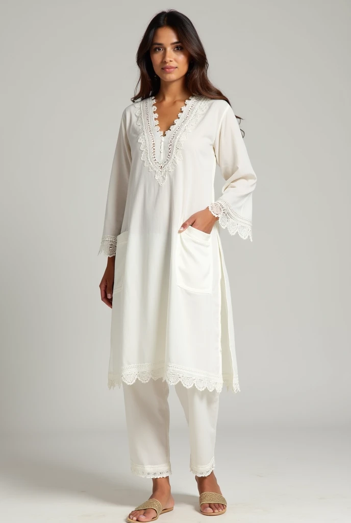 A kurta knee length bell sleeves v neck white color sleeves have laces and v neck also have lace and a trouser with lace at the end and with pockets