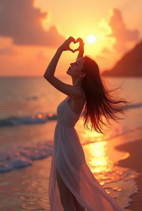 Woman with long black hair looking up at the sunset on the beach making a heart with her hands 