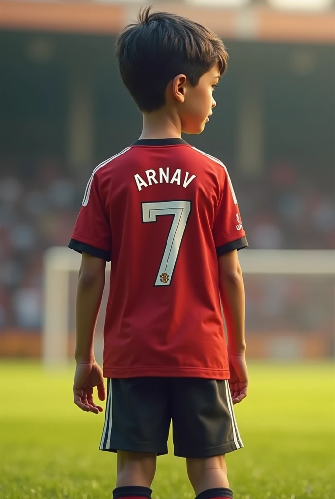  Boy standing wearing manchester united jersey named arnav and number 7