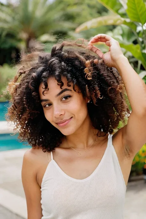 a young mixed-race woman with curly hair