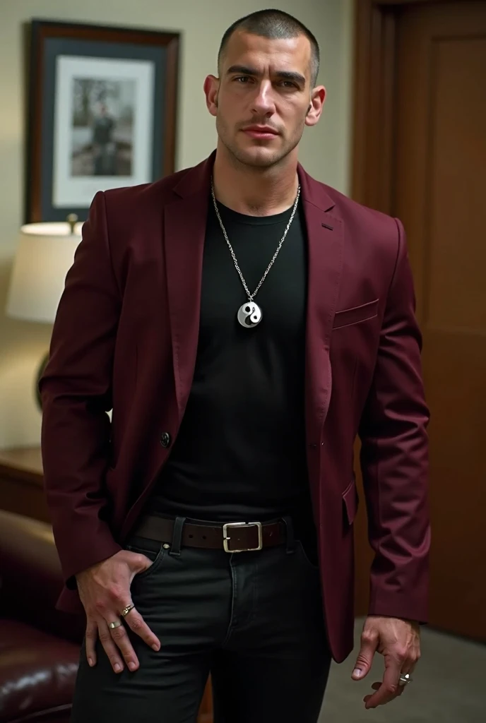 A man, shaved face, a dark red blazer, a black t-shirt, black jeans, Necklace with a yin yang charm, and a ring on his left hand, muscular man, in office