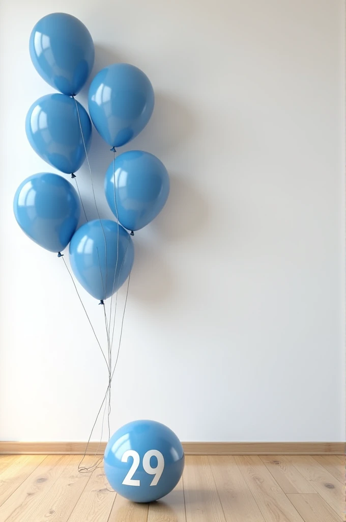 White wall with many navy blue balloons and a single balloon with the number 29 on a brown floor