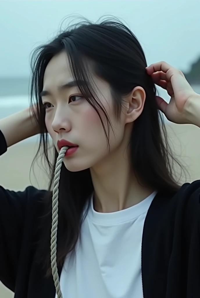 4j, Realistic, Photography, high detailed, close up detail of the face of a handsome Asian man with white skin and long black hair,is tying up her hair ,her lips bit a rope,background of a blurred beach,ghotic,white t-shirt,with a black cardigan as outerwe...