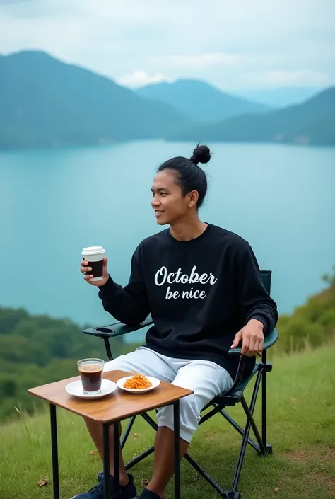 Seorang pria original orang Indonesia dengan rambut yang disanggul pria memakai sweater berwarna hitam bertuliskan " October be nice" wearing white casual shorts , Sitting on a hill at Lake Toba with a smiling facial expression facing forward,  Sit using a...