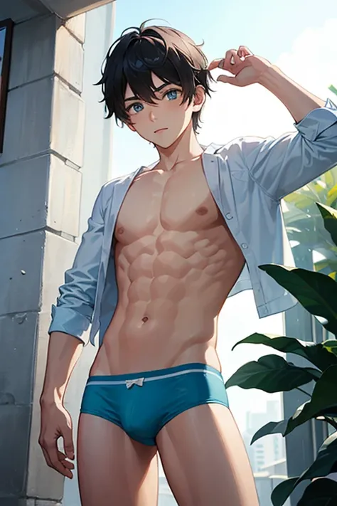 a boy wearing light blue underwear