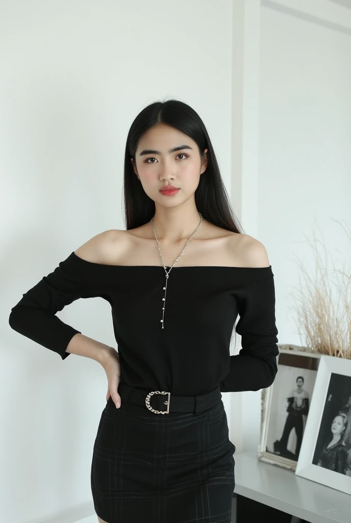 A young Asian woman stands confidently in front of a crisp white wall, dressed in a striking ensemble. Her long, dark hair cascades down her back as she wears a black off-the-shoulder shirt with long sleeves, paired with a plaid black skirt and matching be...