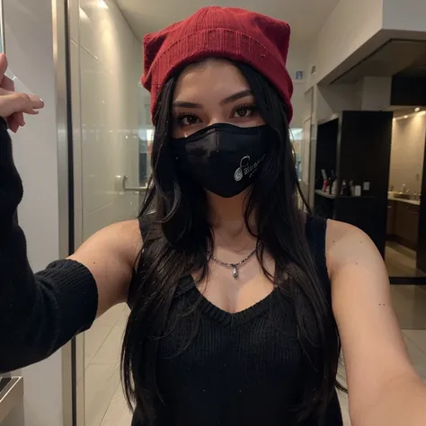 Sexy girl with long black hair taking a selfie with a black mask, a red sweater and a black cap with a black cap and silver chain
