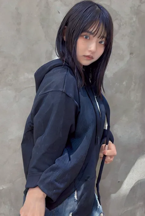 Japanese woman wearing VANS hoodie and black denim