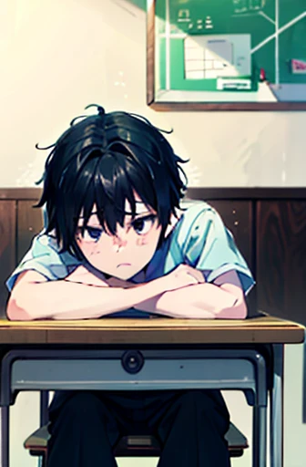 a boy, black hair, sad alone on his desk at school