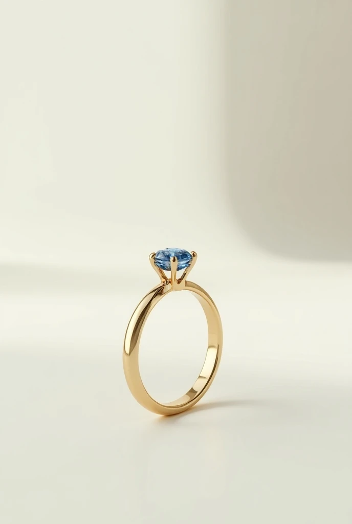 Gold wedding ring in solitaire model with a small blue diamond with a light background that looks realistic and beautiful