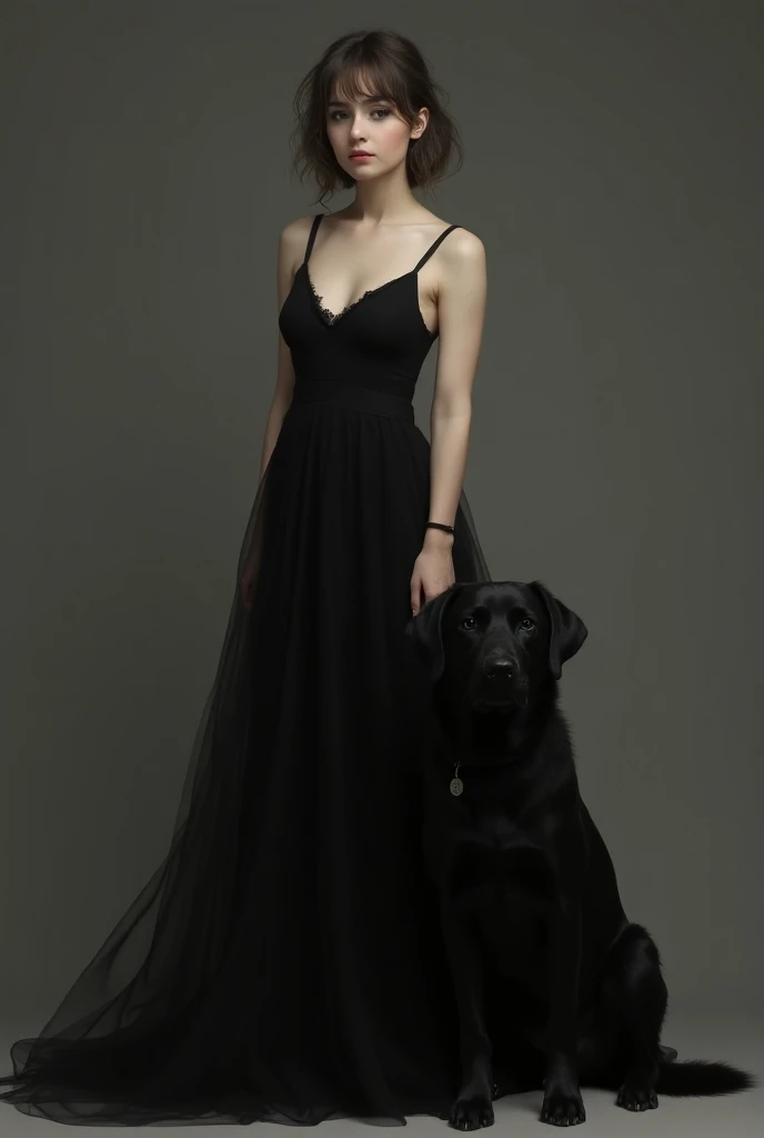  A woman with a black dog , a black dog,  a black dress and that is white.